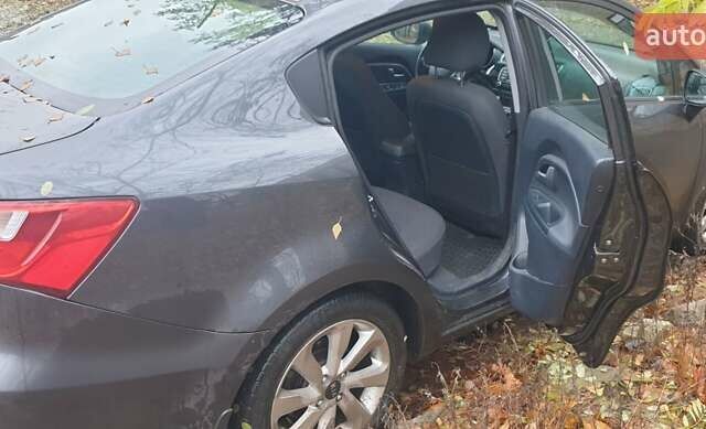 Сірий Кіа Ріо, об'ємом двигуна 1.4 л та пробігом 142 тис. км за 11500 $, фото 6 на Automoto.ua