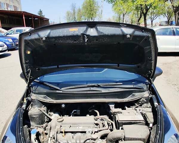 Серый Киа Рио, объемом двигателя 1.4 л и пробегом 72 тыс. км за 9800 $, фото 10 на Automoto.ua