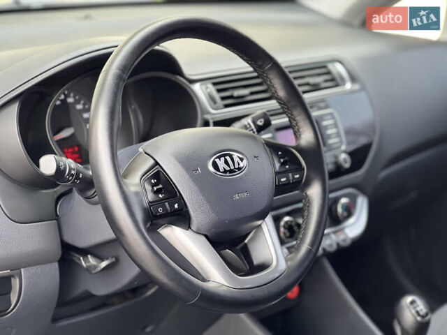 Сірий Кіа Ріо, об'ємом двигуна 1.4 л та пробігом 143 тис. км за 8999 $, фото 6 на Automoto.ua