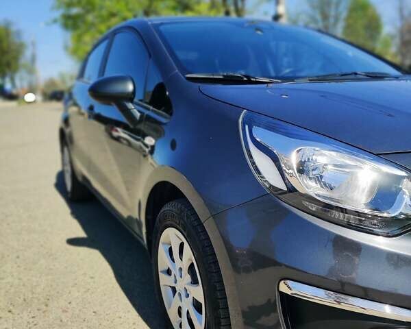 Серый Киа Рио, объемом двигателя 1.4 л и пробегом 72 тыс. км за 9800 $, фото 3 на Automoto.ua