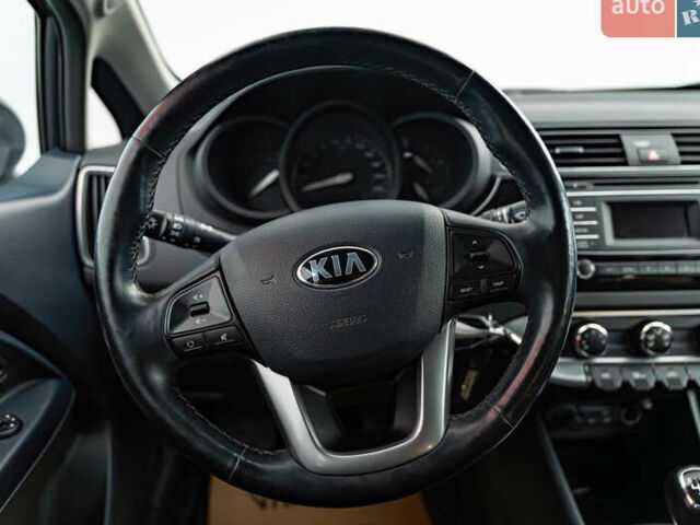 Серый Киа Рио, объемом двигателя 1.4 л и пробегом 75 тыс. км за 8988 $, фото 11 на Automoto.ua