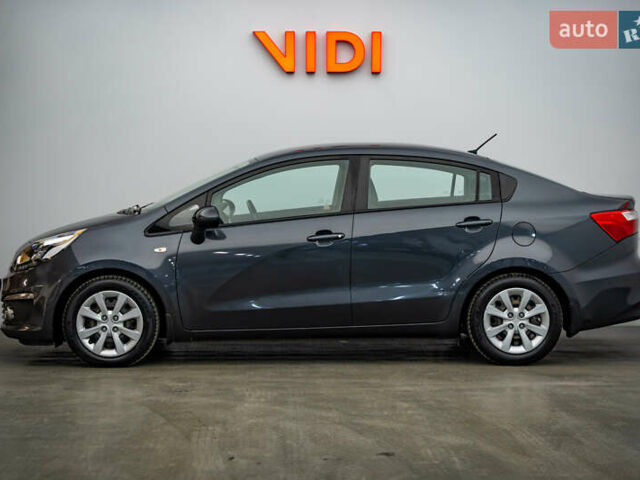 Серый Киа Рио, объемом двигателя 1.4 л и пробегом 75 тыс. км за 8988 $, фото 2 на Automoto.ua