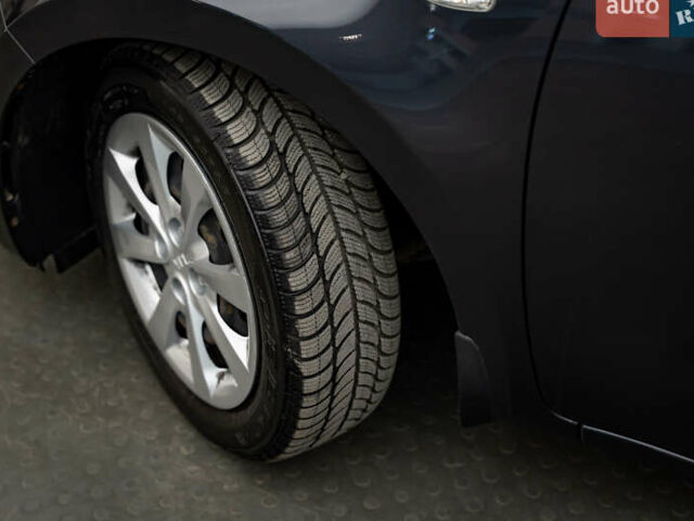 Серый Киа Рио, объемом двигателя 1.4 л и пробегом 75 тыс. км за 8988 $, фото 7 на Automoto.ua