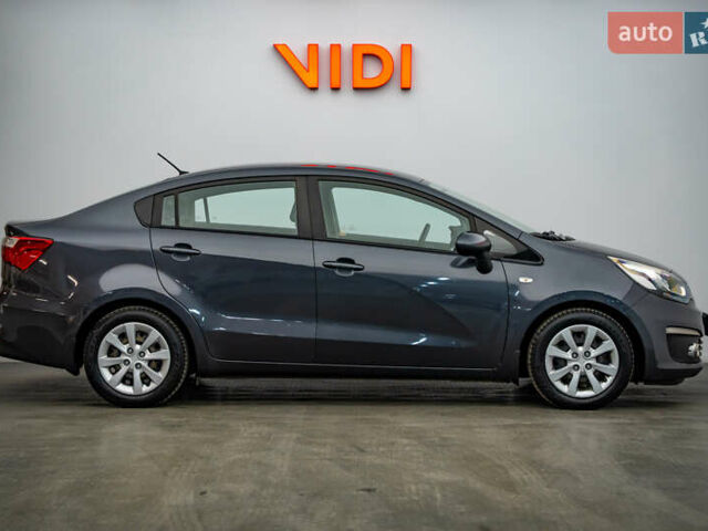 Серый Киа Рио, объемом двигателя 1.4 л и пробегом 75 тыс. км за 8988 $, фото 3 на Automoto.ua