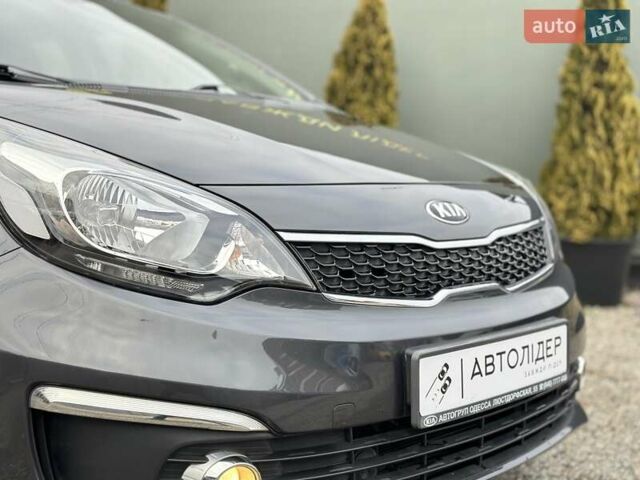 Сірий Кіа Ріо, об'ємом двигуна 1.4 л та пробігом 14 тис. км за 12990 $, фото 5 на Automoto.ua