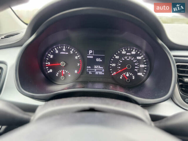 Серый Киа Рио, объемом двигателя 1.6 л и пробегом 65 тыс. км за 12800 $, фото 21 на Automoto.ua