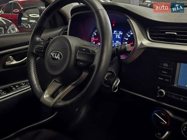 Сірий Кіа Ріо, об'ємом двигуна 1.37 л та пробігом 60 тис. км за 13999 $, фото 11 на Automoto.ua