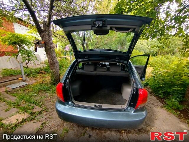 Серый Киа Рио, объемом двигателя 1.5 л и пробегом 315 тыс. км за 2300 $, фото 3 на Automoto.ua