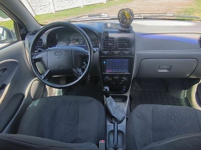 Сірий Кіа Ріо, об'ємом двигуна 1.3 л та пробігом 270 тис. км за 2203 $, фото 6 на Automoto.ua