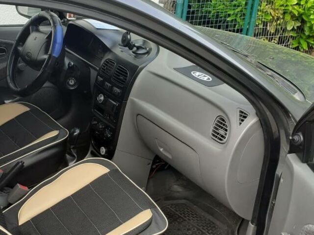 Серый Киа Рио, объемом двигателя 1.3 л и пробегом 240 тыс. км за 3443 $, фото 5 на Automoto.ua