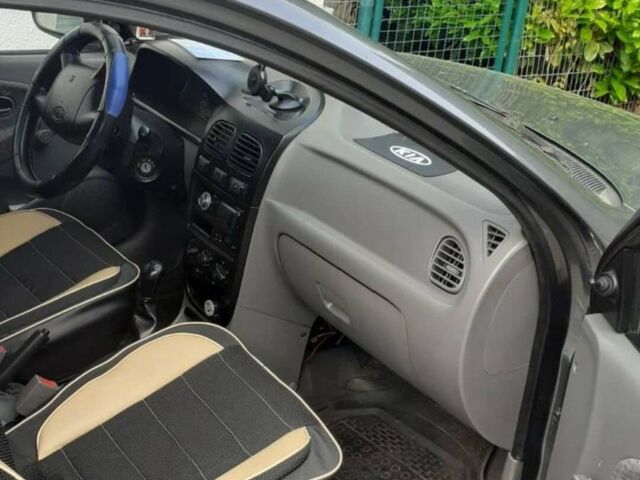 Сірий Кіа Ріо, об'ємом двигуна 1.3 л та пробігом 240 тис. км за 3498 $, фото 5 на Automoto.ua