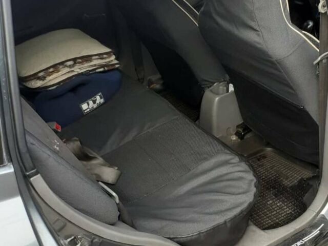 Сірий Кіа Ріо, об'ємом двигуна 1.3 л та пробігом 240 тис. км за 3498 $, фото 4 на Automoto.ua