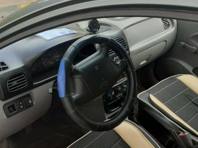 Сірий Кіа Ріо, об'ємом двигуна 1.3 л та пробігом 240 тис. км за 3498 $, фото 7 на Automoto.ua