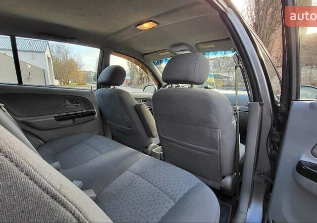 Сірий Кіа Ріо, об'ємом двигуна 1.49 л та пробігом 236 тис. км за 3300 $, фото 19 на Automoto.ua