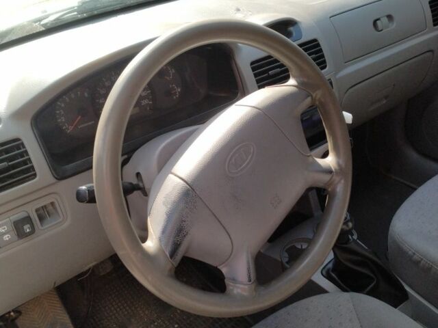 Серый Киа Рио, объемом двигателя 1.3 л и пробегом 394 тыс. км за 2309 $, фото 9 на Automoto.ua