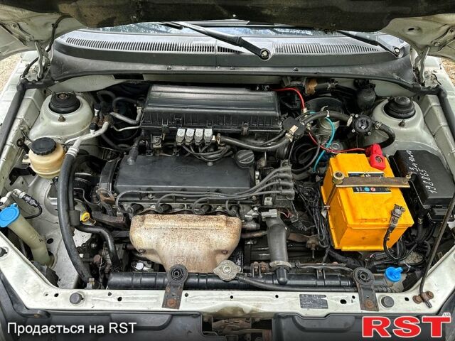 Серый Киа Рио, объемом двигателя 1.3 л и пробегом 206 тыс. км за 1750 $, фото 11 на Automoto.ua
