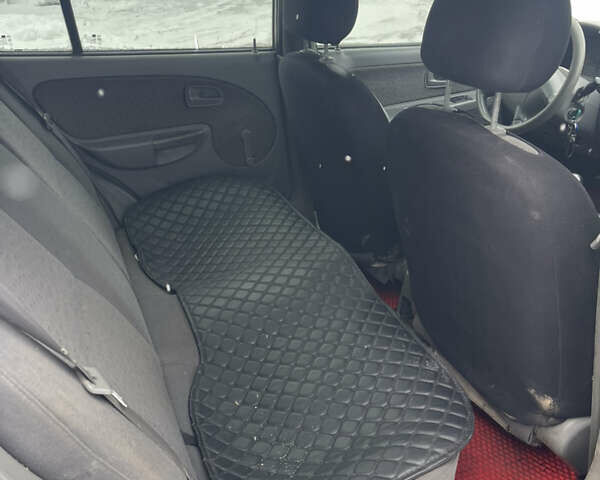 Сірий Кіа Ріо, об'ємом двигуна 1.34 л та пробігом 402 тис. км за 3300 $, фото 11 на Automoto.ua