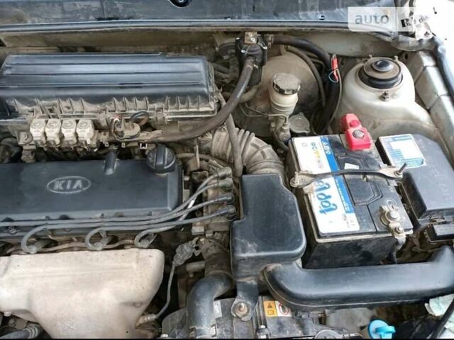 Серый Киа Рио, объемом двигателя 1.34 л и пробегом 214 тыс. км за 3100 $, фото 9 на Automoto.ua