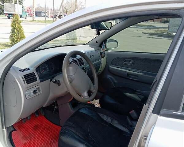 Серый Киа Рио, объемом двигателя 1.34 л и пробегом 380 тыс. км за 3000 $, фото 5 на Automoto.ua