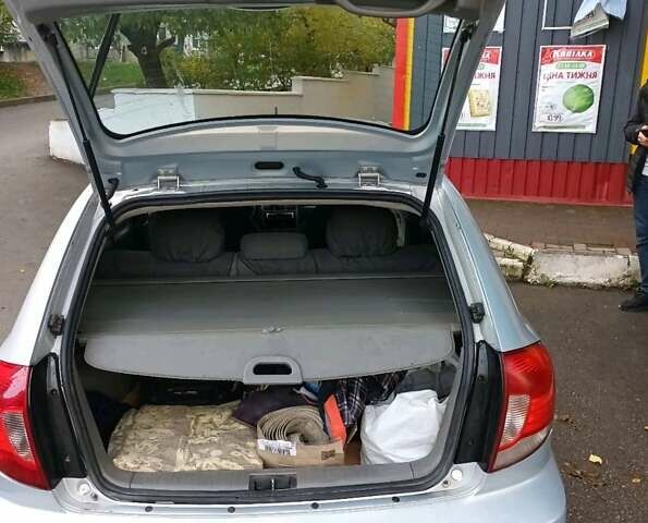 Серый Киа Рио, объемом двигателя 1.34 л и пробегом 214 тыс. км за 3100 $, фото 10 на Automoto.ua