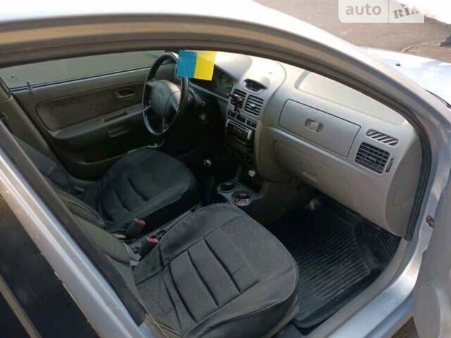 Серый Киа Рио, объемом двигателя 1.34 л и пробегом 214 тыс. км за 3100 $, фото 6 на Automoto.ua