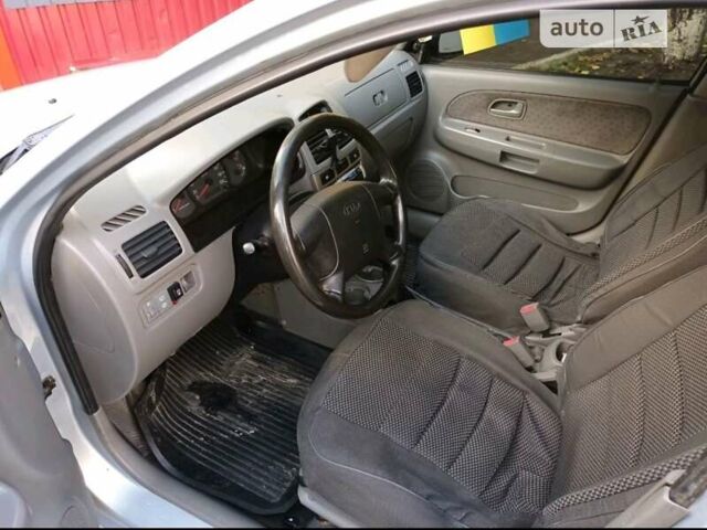 Серый Киа Рио, объемом двигателя 1.34 л и пробегом 214 тыс. км за 3100 $, фото 4 на Automoto.ua