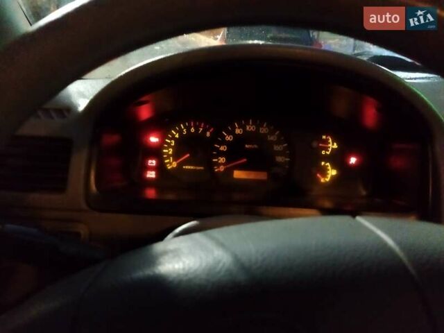 Серый Киа Рио, объемом двигателя 1.34 л и пробегом 380 тыс. км за 3000 $, фото 10 на Automoto.ua