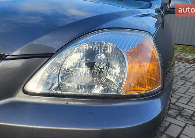 Сірий Кіа Ріо, об'ємом двигуна 1.49 л та пробігом 236 тис. км за 3300 $, фото 9 на Automoto.ua