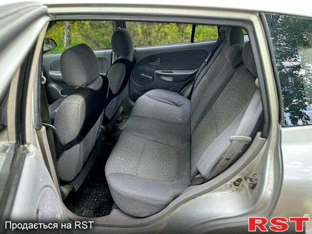 Серый Киа Рио, объемом двигателя 1.3 л и пробегом 206 тыс. км за 1750 $, фото 7 на Automoto.ua