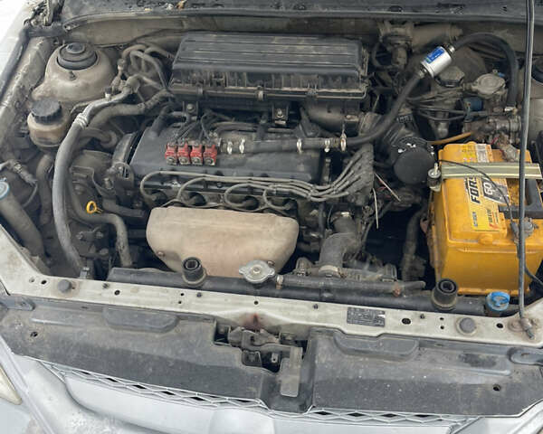 Сірий Кіа Ріо, об'ємом двигуна 1.34 л та пробігом 402 тис. км за 3300 $, фото 14 на Automoto.ua