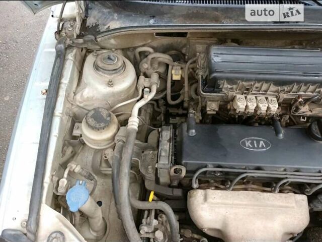 Серый Киа Рио, объемом двигателя 1.34 л и пробегом 214 тыс. км за 3100 $, фото 7 на Automoto.ua