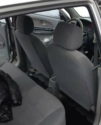 Серый Киа Рио, объемом двигателя 1.34 л и пробегом 145 тыс. км за 2300 $, фото 9 на Automoto.ua