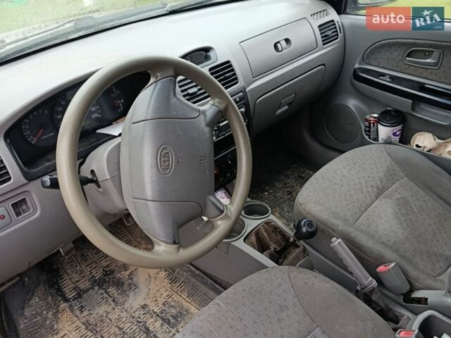 Сірий Кіа Ріо, об'ємом двигуна 1.4 л та пробігом 457 тис. км за 1100 $, фото 5 на Automoto.ua