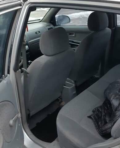 Серый Киа Рио, объемом двигателя 1.34 л и пробегом 145 тыс. км за 2300 $, фото 10 на Automoto.ua