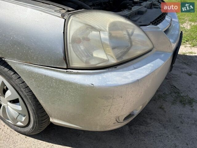 Серый Киа Рио, объемом двигателя 1.3 л и пробегом 181 тыс. км за 2200 $, фото 24 на Automoto.ua