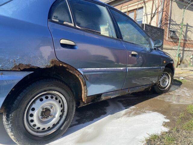 Синій Кіа Ріо, об'ємом двигуна 1.5 л та пробігом 200 тис. км за 600 $, фото 3 на Automoto.ua