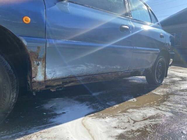 Синій Кіа Ріо, об'ємом двигуна 1.5 л та пробігом 200 тис. км за 600 $, фото 4 на Automoto.ua