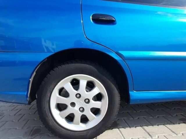 Синій Кіа Ріо, об'ємом двигуна 1.3 л та пробігом 208 тис. км за 4800 $, фото 24 на Automoto.ua