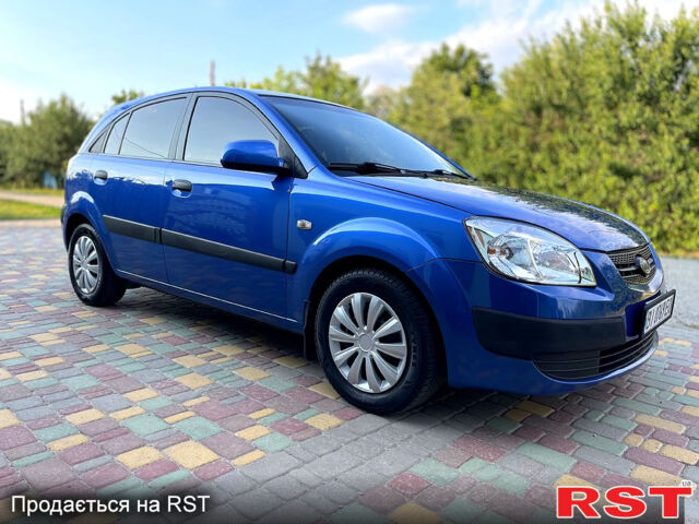 Синій Кіа Ріо, об'ємом двигуна 1.4 л та пробігом 182 тис. км за 4350 $, фото 11 на Automoto.ua