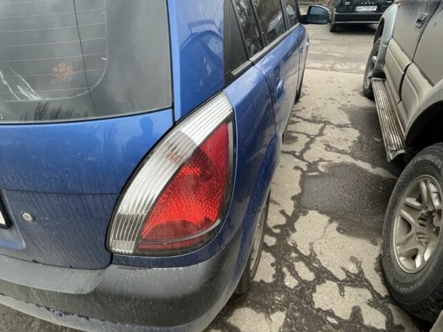Синий Киа Рио, объемом двигателя 1.4 л и пробегом 210 тыс. км за 5000 $, фото 4 на Automoto.ua