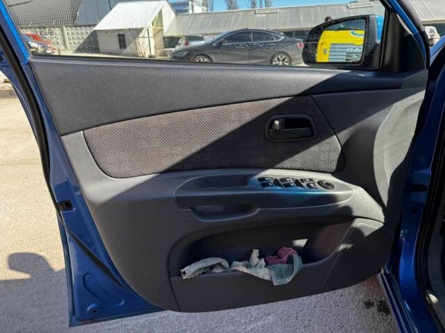Синій Кіа Ріо, об'ємом двигуна 1.4 л та пробігом 343 тис. км за 4690 $, фото 10 на Automoto.ua