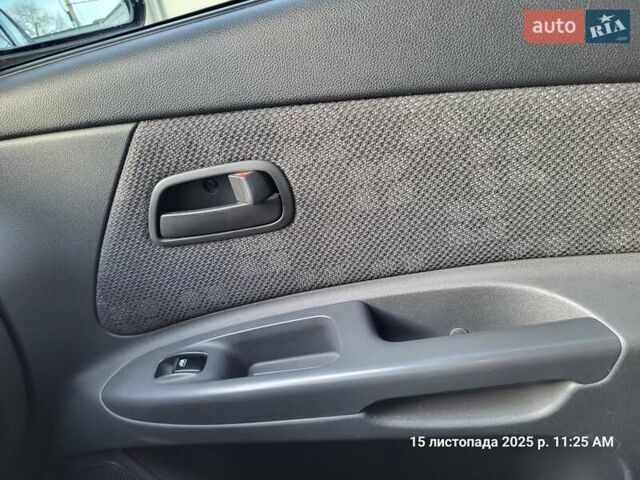 Синій Кіа Ріо, об'ємом двигуна 1.4 л та пробігом 85 тис. км за 5900 $, фото 9 на Automoto.ua