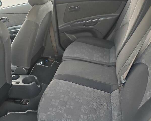 Синий Киа Рио, объемом двигателя 1.4 л и пробегом 339 тыс. км за 4800 $, фото 7 на Automoto.ua