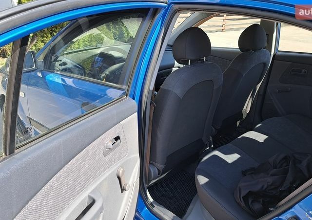 Синий Киа Рио, объемом двигателя 1.4 л и пробегом 155 тыс. км за 4700 $, фото 19 на Automoto.ua