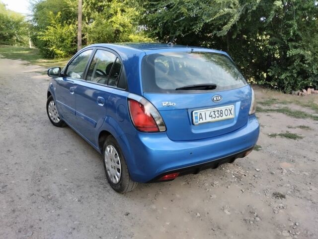 Синій Кіа Ріо, об'ємом двигуна 1.4 л та пробігом 198 тис. км за 4150 $, фото 11 на Automoto.ua