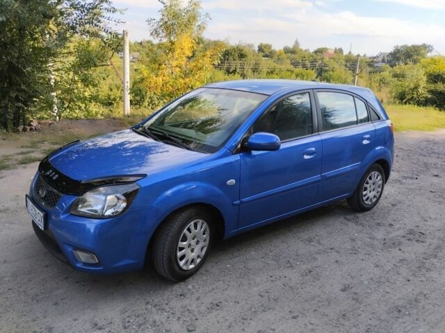 Синій Кіа Ріо, об'ємом двигуна 1.4 л та пробігом 198 тис. км за 4150 $, фото 2 на Automoto.ua
