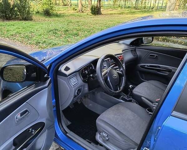 Синий Киа Рио, объемом двигателя 1.4 л и пробегом 142 тыс. км за 4200 $, фото 12 на Automoto.ua