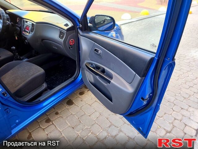 Синій Кіа Ріо, об'ємом двигуна 1.4 л та пробігом 165 тис. км за 4850 $, фото 11 на Automoto.ua