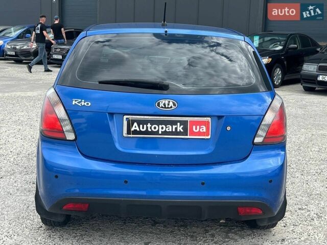 Синій Кіа Ріо, об'ємом двигуна 1.4 л та пробігом 190 тис. км за 5490 $, фото 5 на Automoto.ua