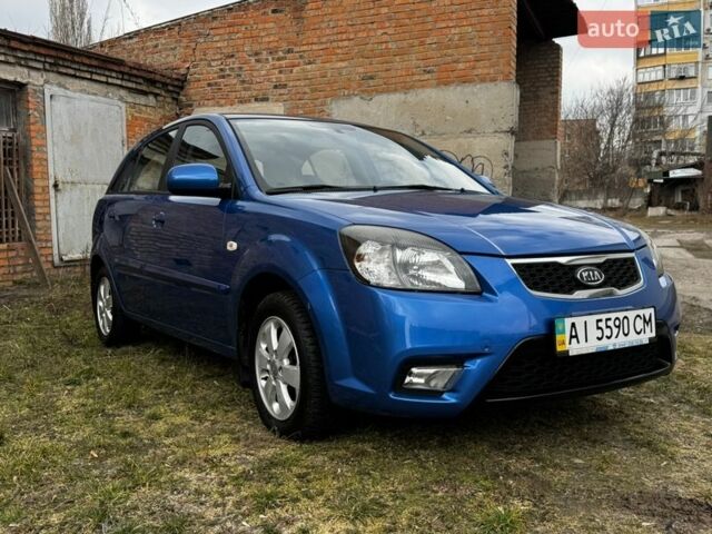 Синій Кіа Ріо, об'ємом двигуна 1.4 л та пробігом 93 тис. км за 8200 $, фото 1 на Automoto.ua